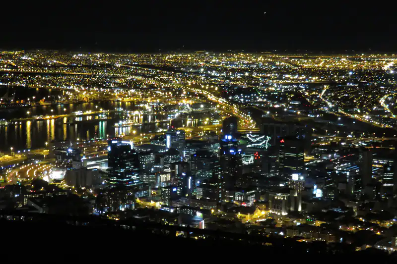 The lights of central Cape Town and the harbour at night, seen from Signal Hill.